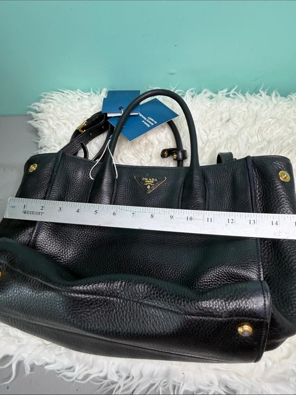 Authentic Prada Black  Leather Satchel with Gold Logo .